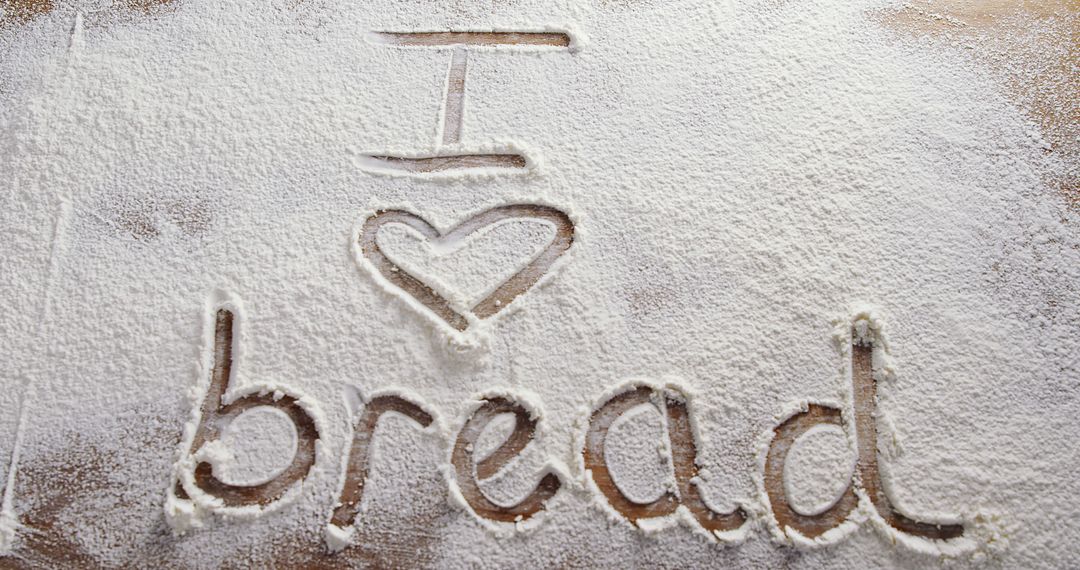 Words I love bread are written in flour scattered on a surface, with copy space - Free Images, Stock Photos and Pictures on Pikwizard.com