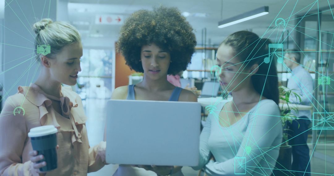 Diverse Businesswomen Collaborating on Digital Innovation Project