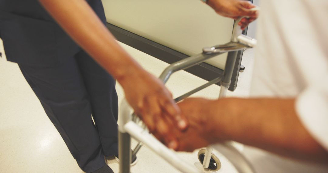 Nurse Assisting Elderly Patient With Walker in Hospital - Free Images, Stock Photos and Pictures on Pikwizard.com