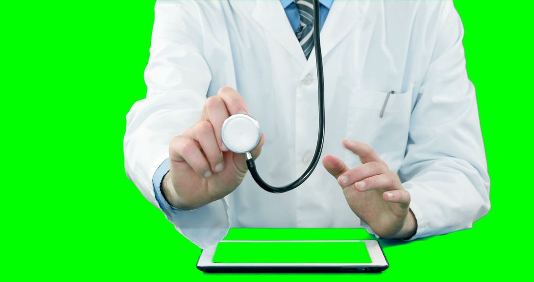 Doctor Using Stethoscope with Digital Tablet on Green Screen Background - Free Images, Stock Photos and Pictures on Pikwizard.com