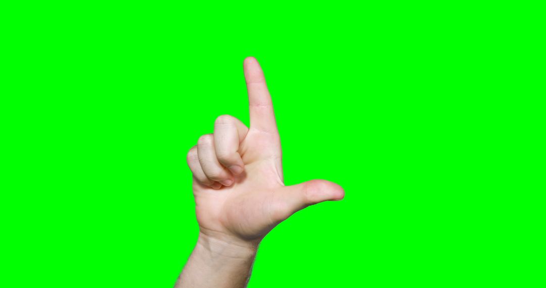 Hand Gesture Forming Letter L on Bright Green Background - Free Images, Stock Photos and Pictures on Pikwizard.com