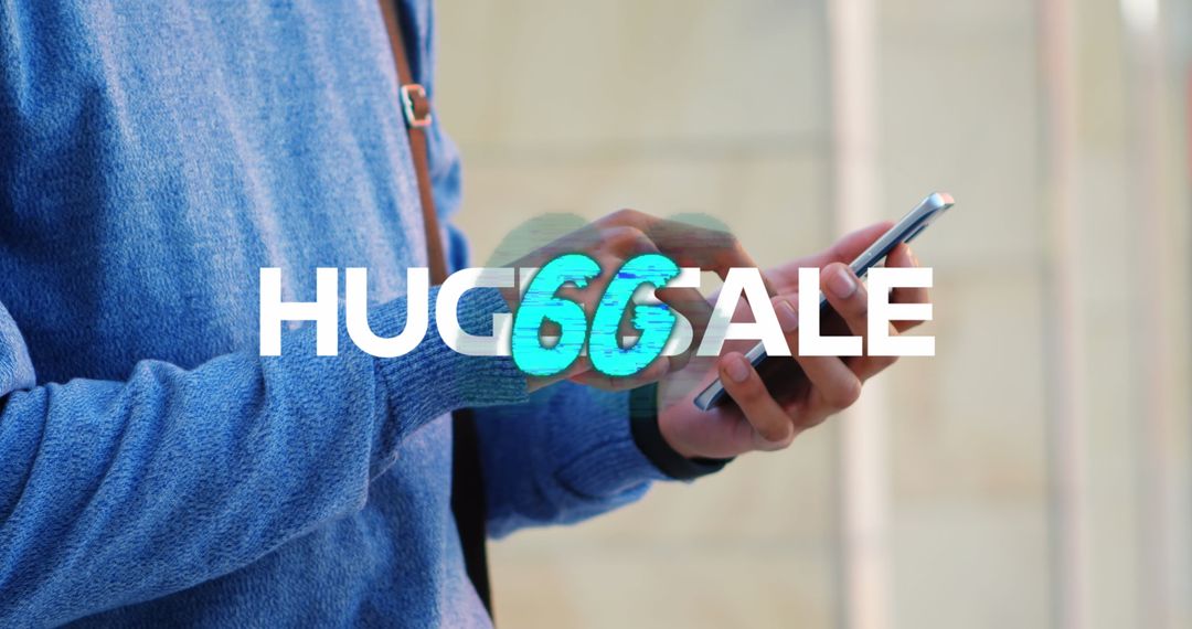 Casually Dressed Young Man Using Smartphone in Urban Environment