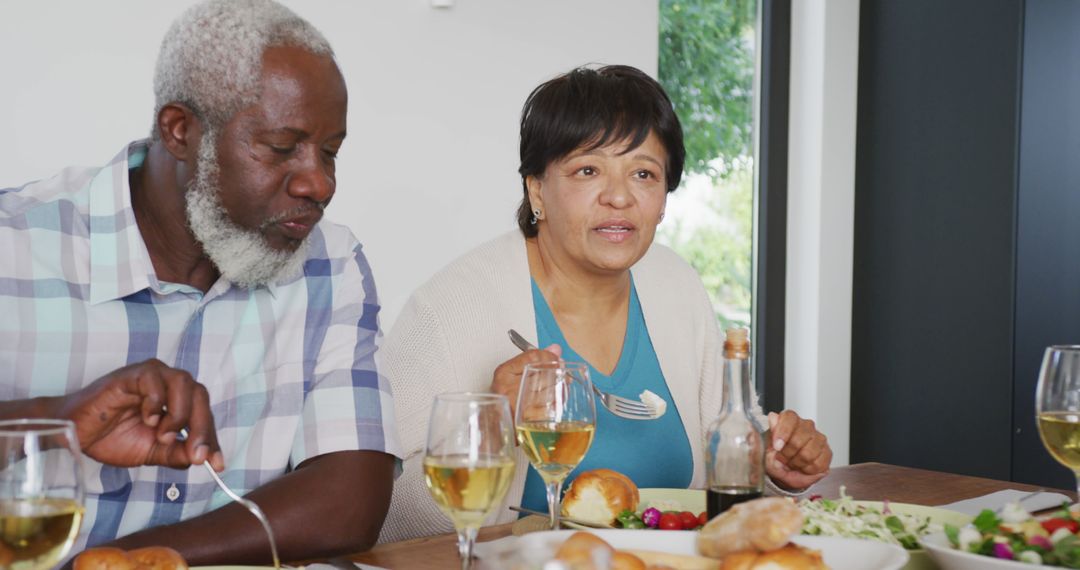 Senior Couple Enjoying Dinner Together at Home