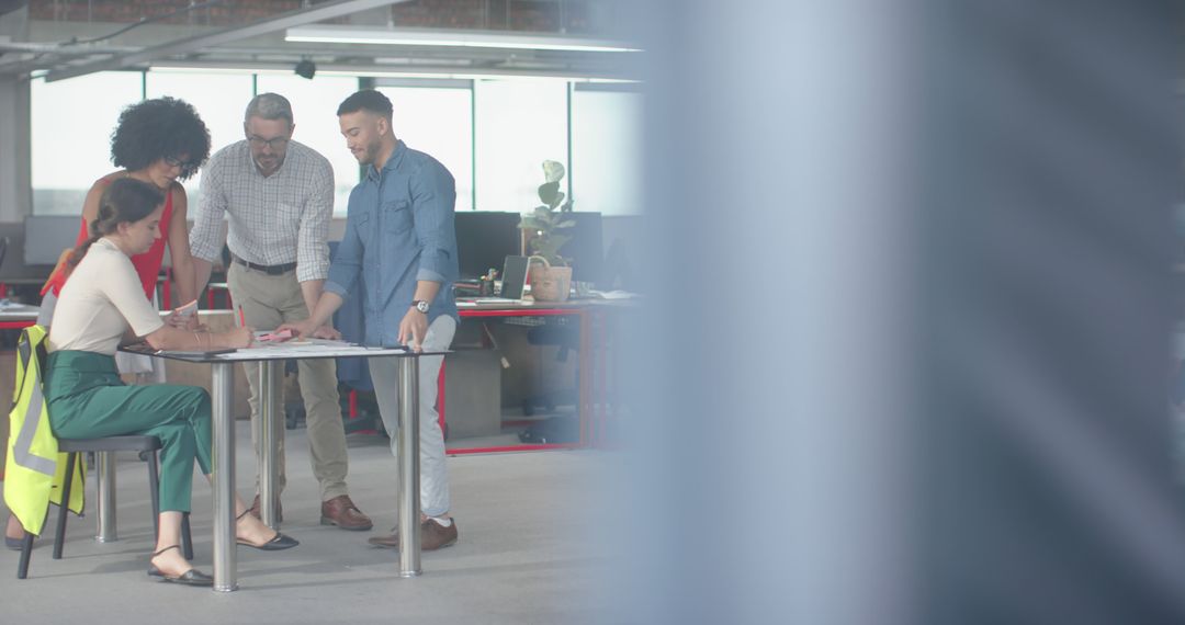 Diverse Engineering Team Collaborating in Modern Office