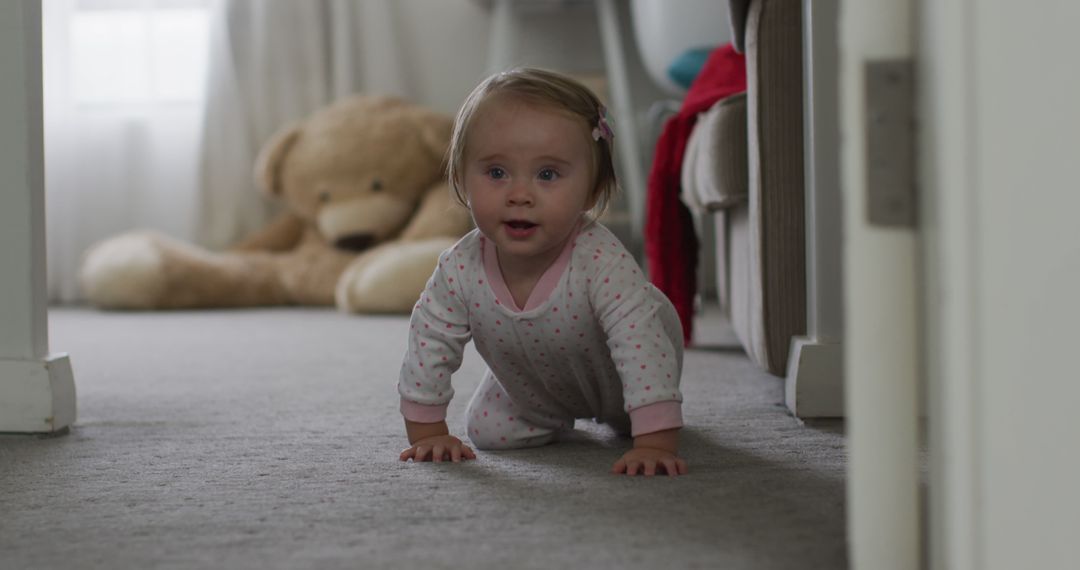Cute Baby Girl Crawling on Carpet with Stuffed Bear in Background - Free Images, Stock Photos and Pictures on Pikwizard.com