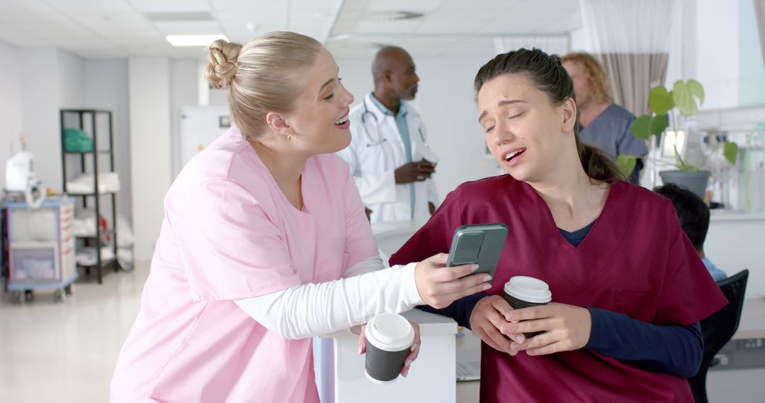 Nurses Enjoying Coffee Break and Laughing Together in Hospital - Free Images, Stock Photos and Pictures on Pikwizard.com