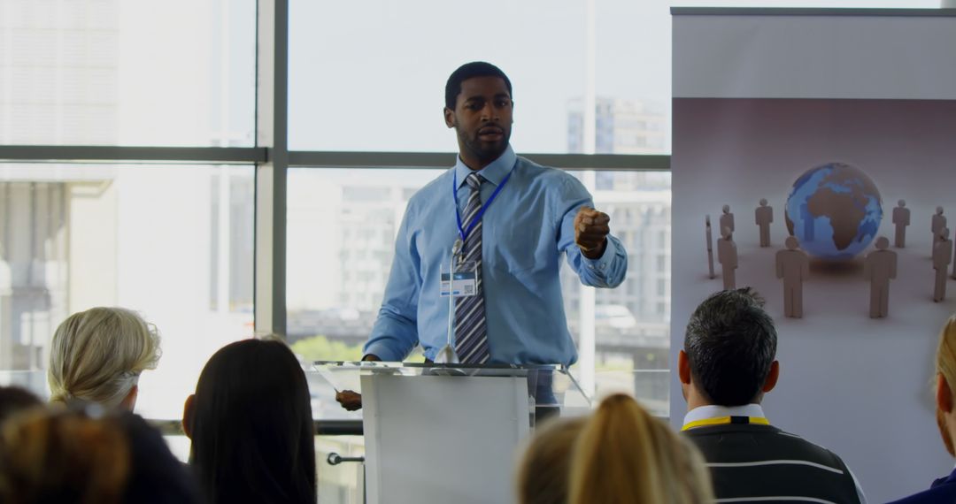 Confident Business Speaker Communicating at Modern Seminar