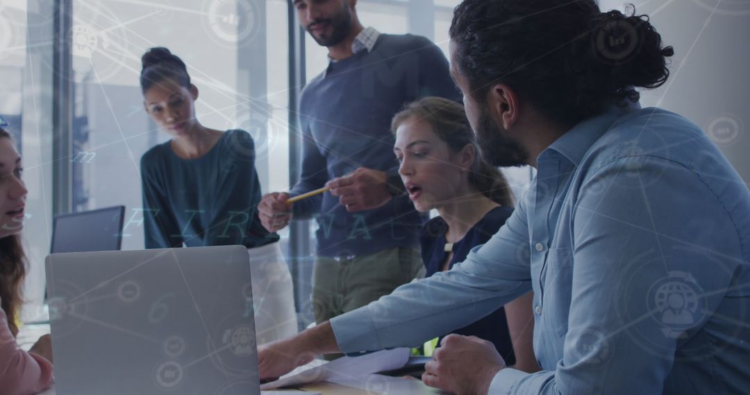 Business Team Collaborating on Digital Project in Office