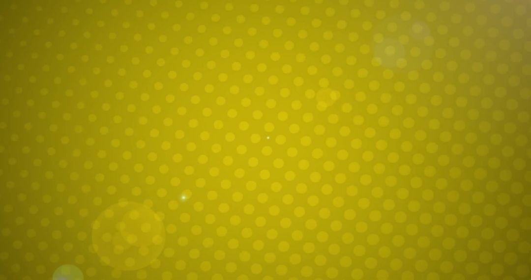 Polka Dot Pattern on Vibrant Yellow Backdrop