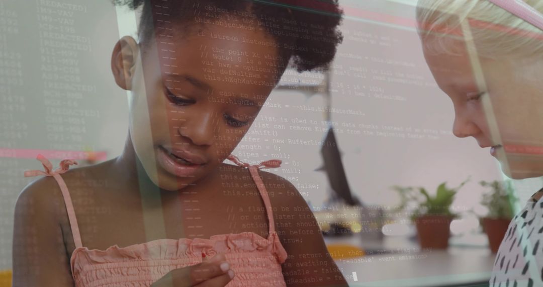 Girls Engaged in Coding Discussion at Home