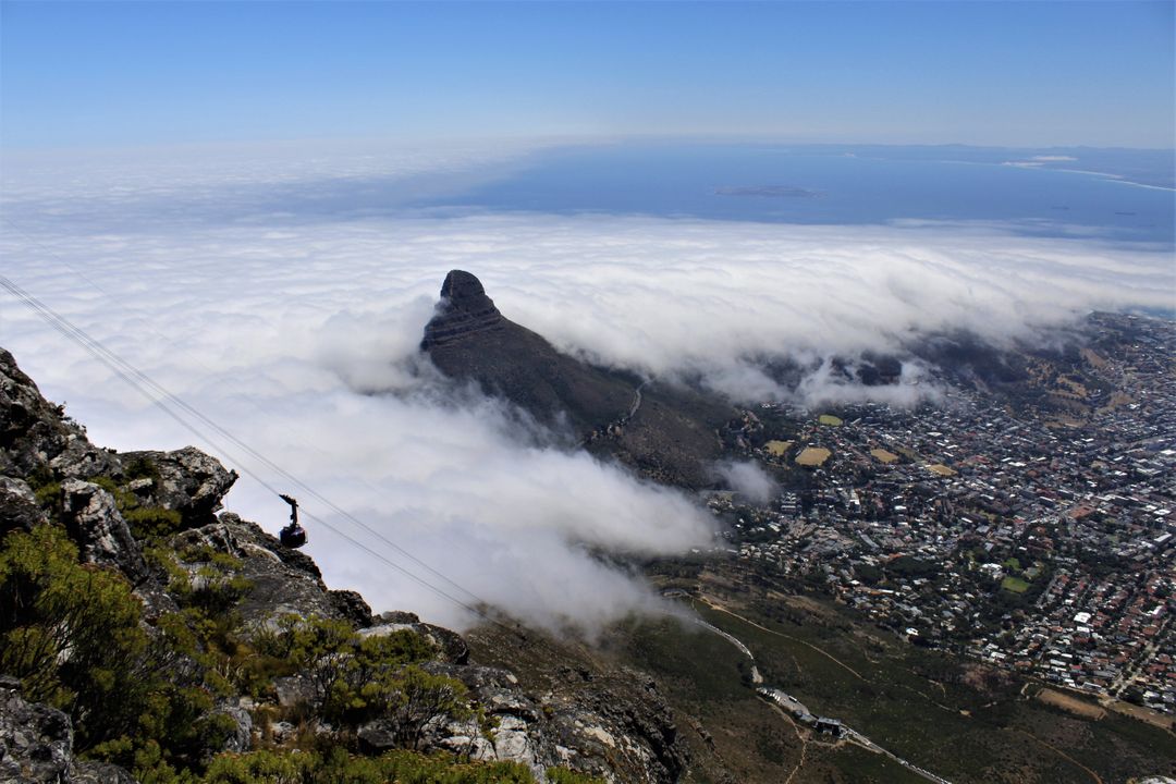 Aerial View of Lion's Head Mountain and Fog Over Cape Town - Free Images, Stock Photos and Pictures on Pikwizard.com