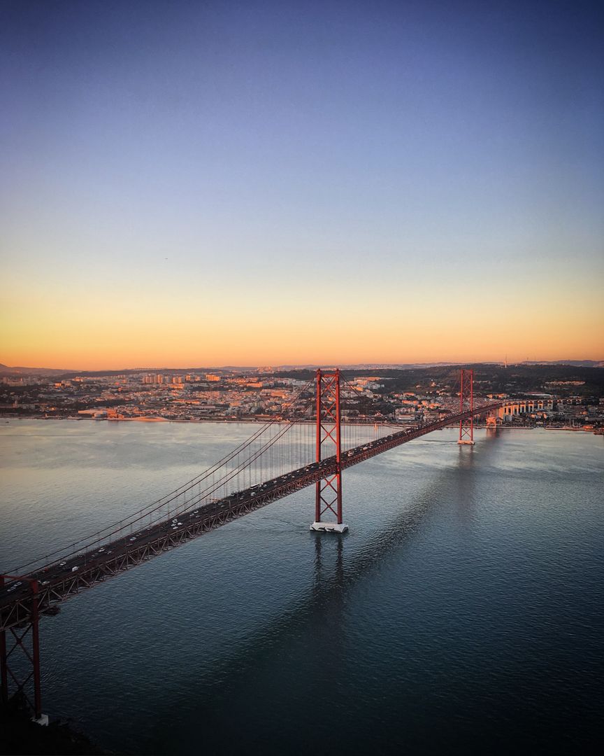 Sunset Over Ponte 25 de Abril Bridge in Lisbon