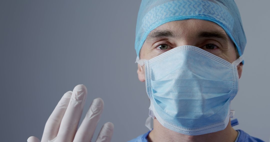 Close-up of Medical Professional Wearing Surgical Mask and Gloves - Free Images, Stock Photos and Pictures on Pikwizard.com