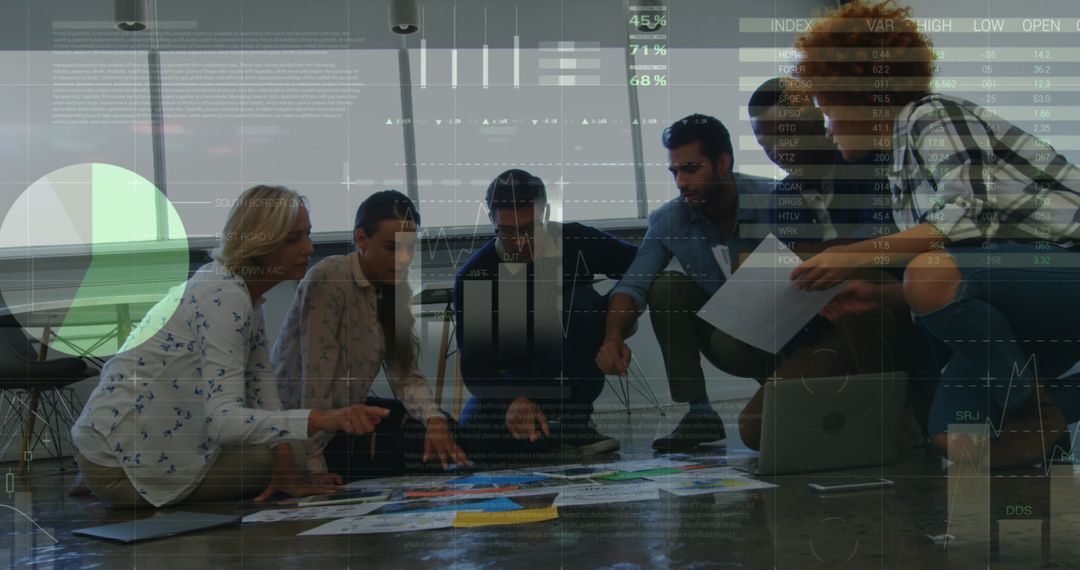 Team Analyzing Business Data with Visual Charts and Graphs