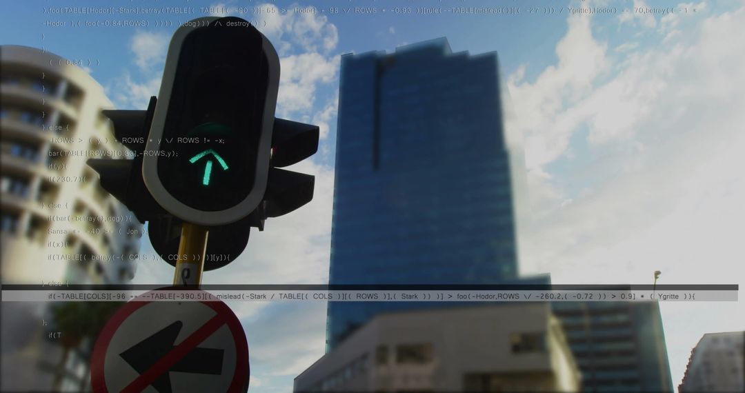 Urban Intersection with Green Arrow Traffic Light and Skyscraper Background