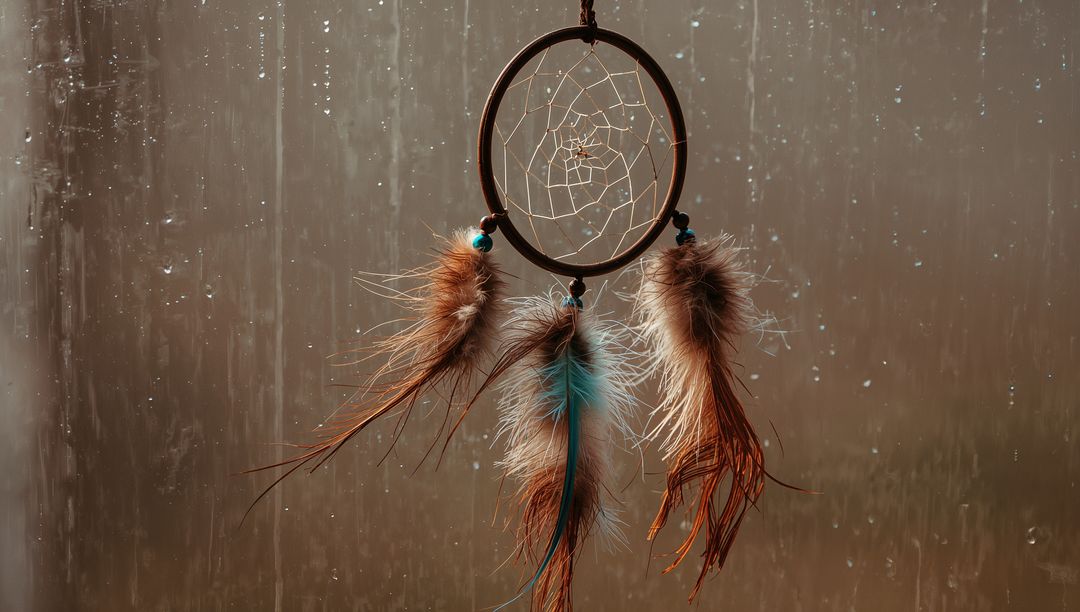 Dreamcatcher Before Rain-Soaked Window Inspiring Calm and Reflection