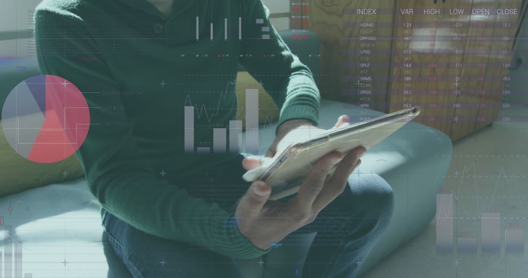 Business Professional Analyzing Statistical Data on Digital Tablet