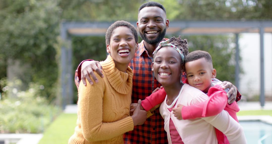 Happy African American Family Posing Together Outside - Free Images, Stock Photos and Pictures on Pikwizard.com