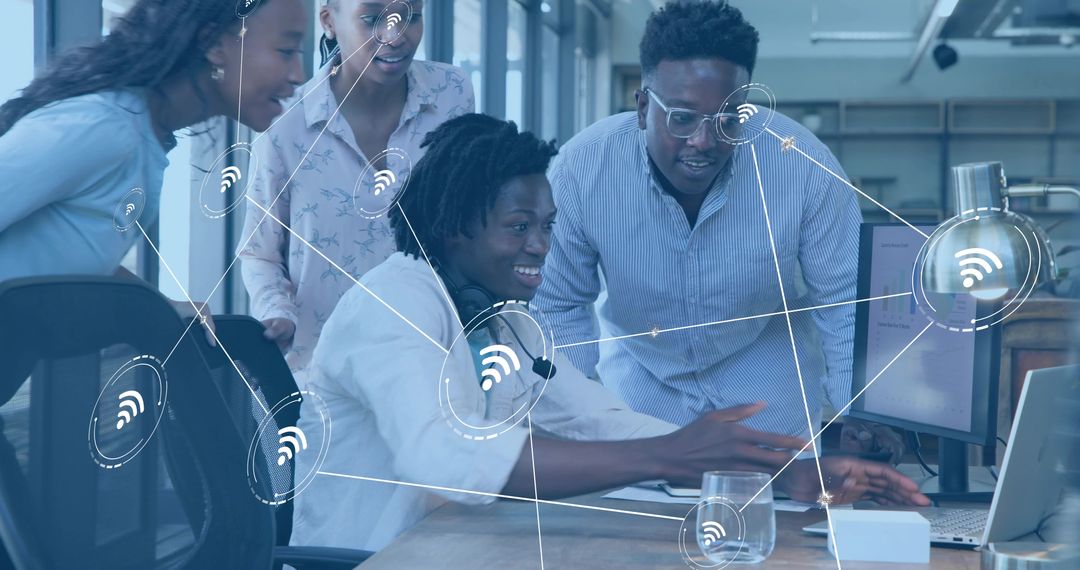 Collaborative team designing connected WiFi network at modern office workstation