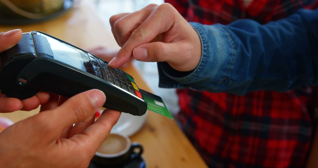 Customer Using Credit Card for Contactless Payment - Free Images, Stock Photos and Pictures on Pikwizard.com