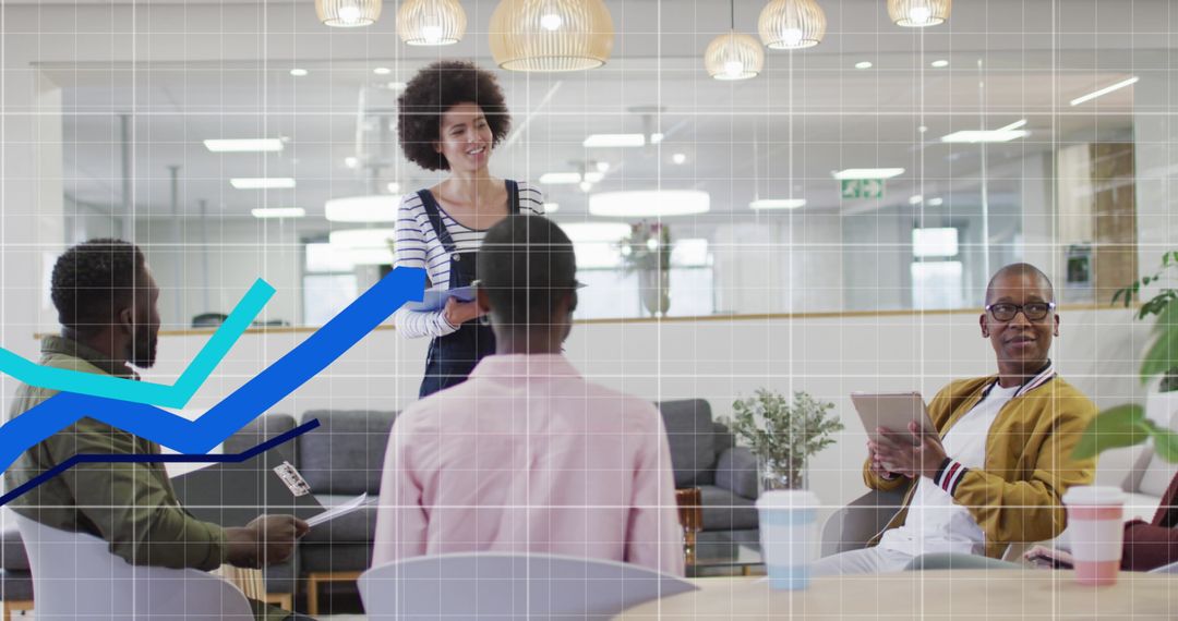 Creative Team Reviewing Business Data in Modern Office