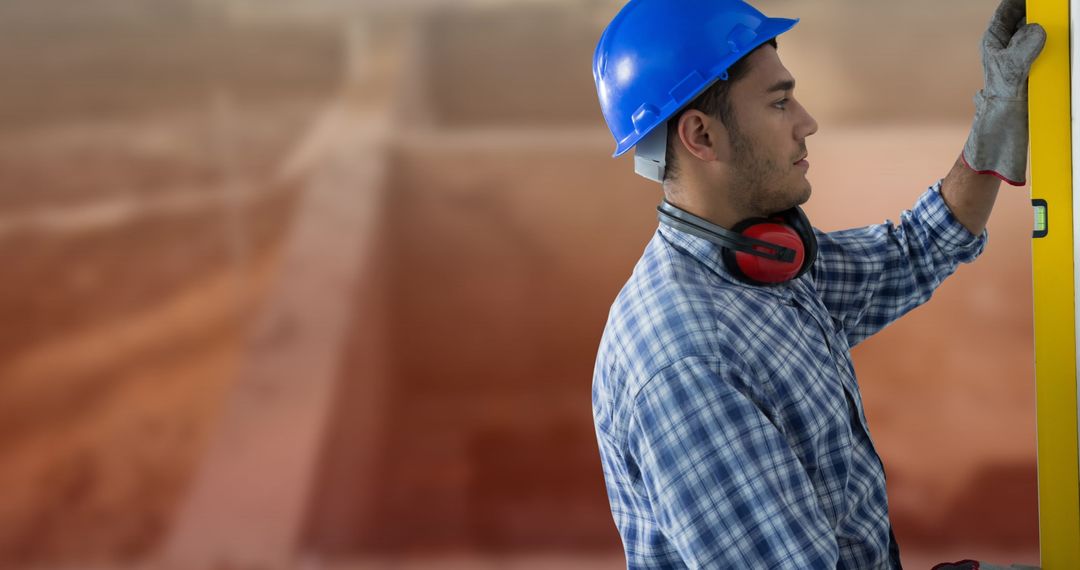 Construction Worker Using Level Tool at Building Site for Precision Work