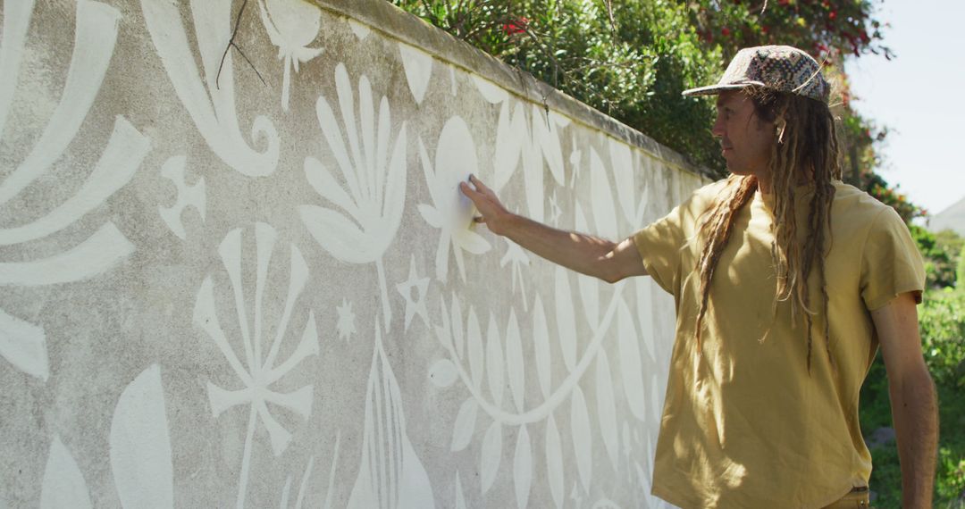 Artist Creating Street Mural with Tropical Theme - Free Images, Stock Photos and Pictures on Pikwizard.com