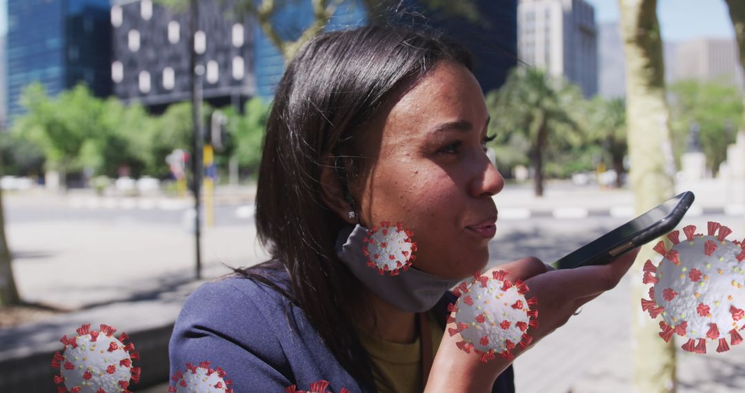Woman Communicating via Smartphone with Viral Graphics in Cityscape