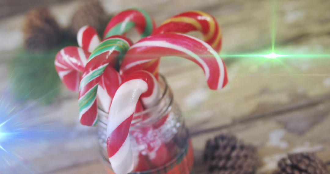 Festive Candy Canes in Jar with Bright Colorful Lights
