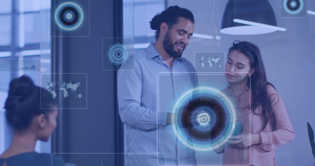 Diverse Business Team Analyzing Digital Data in Modern Office