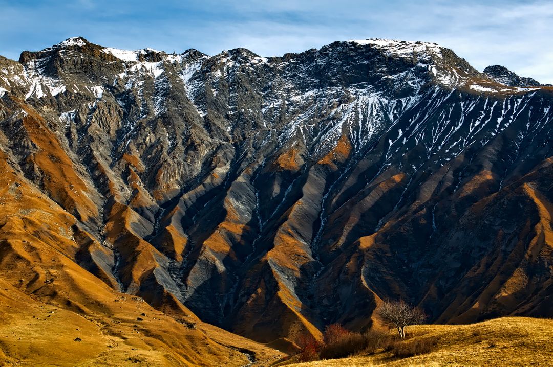 Majestic Rocky Mountain Range with Sparse Vegetation - Free Images, Stock Photos and Pictures on Pikwizard.com