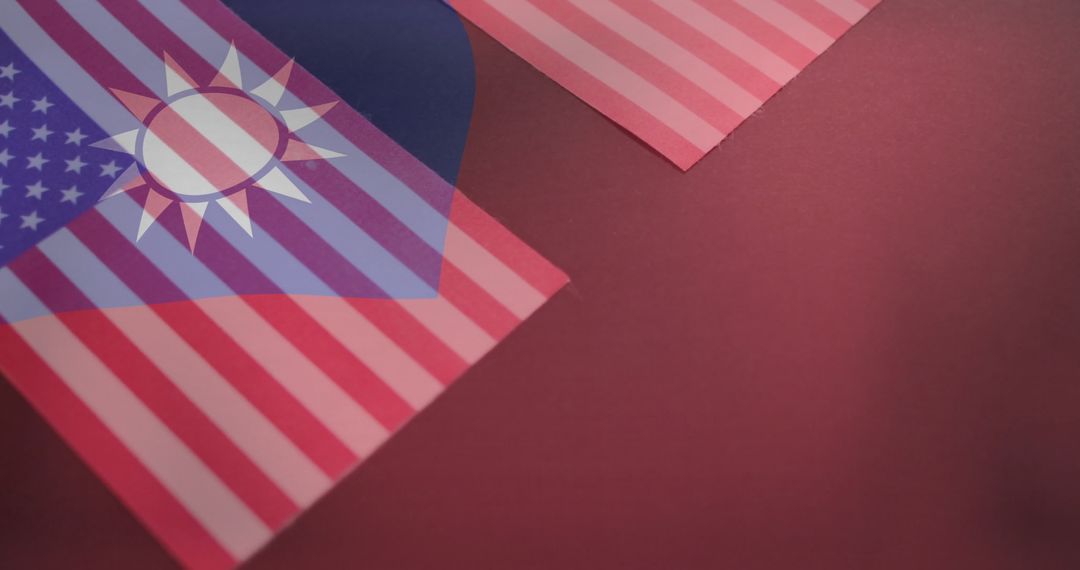 United States and Taiwan Flags Overlapping on Red Background