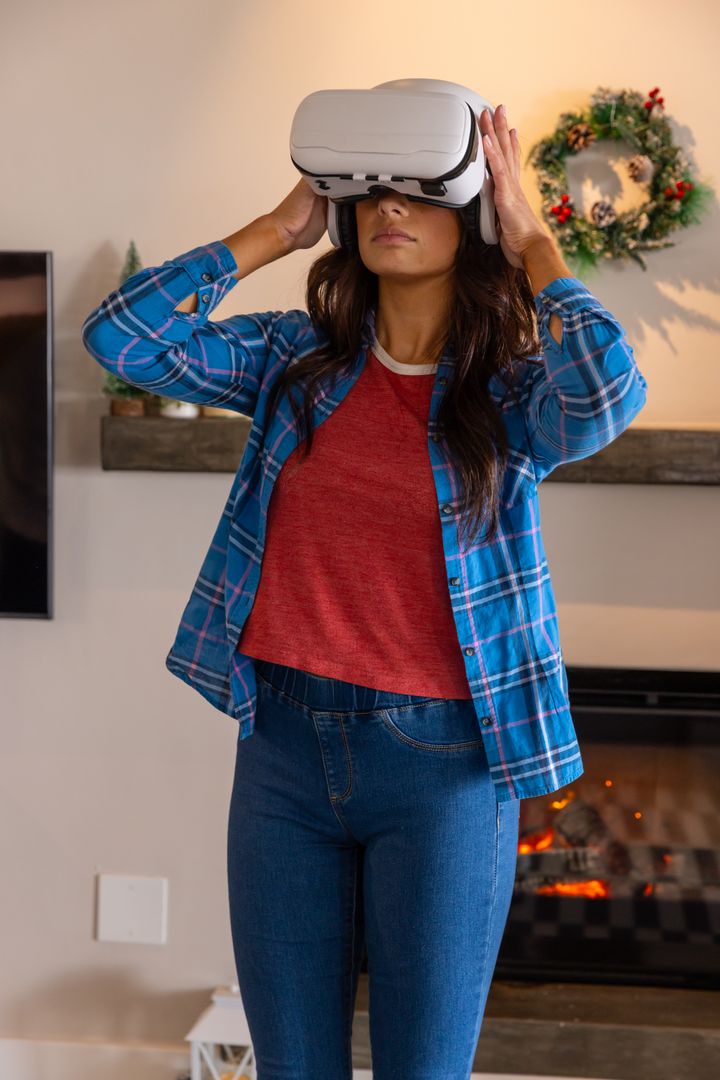 Woman Experiencing Virtual Reality in Cozy Holiday Home
