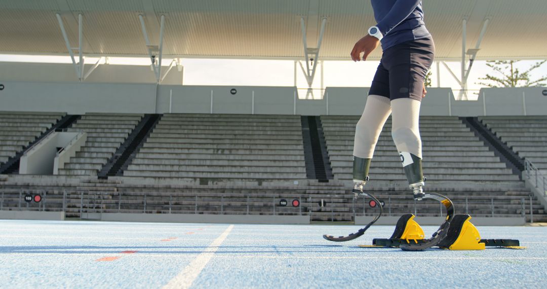 Para-Athlete Training on Track Field with Prosthetic Running Blades - Free Images, Stock Photos and Pictures on Pikwizard.com