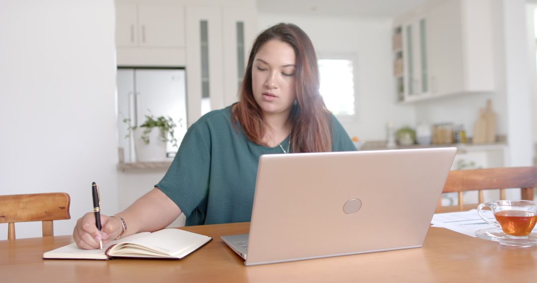 Focused Plus Size Woman Balancing Work from Home Duties