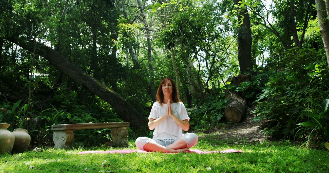 Woman Meditating in Peaceful Forest - Free Images, Stock Photos and Pictures on Pikwizard.com