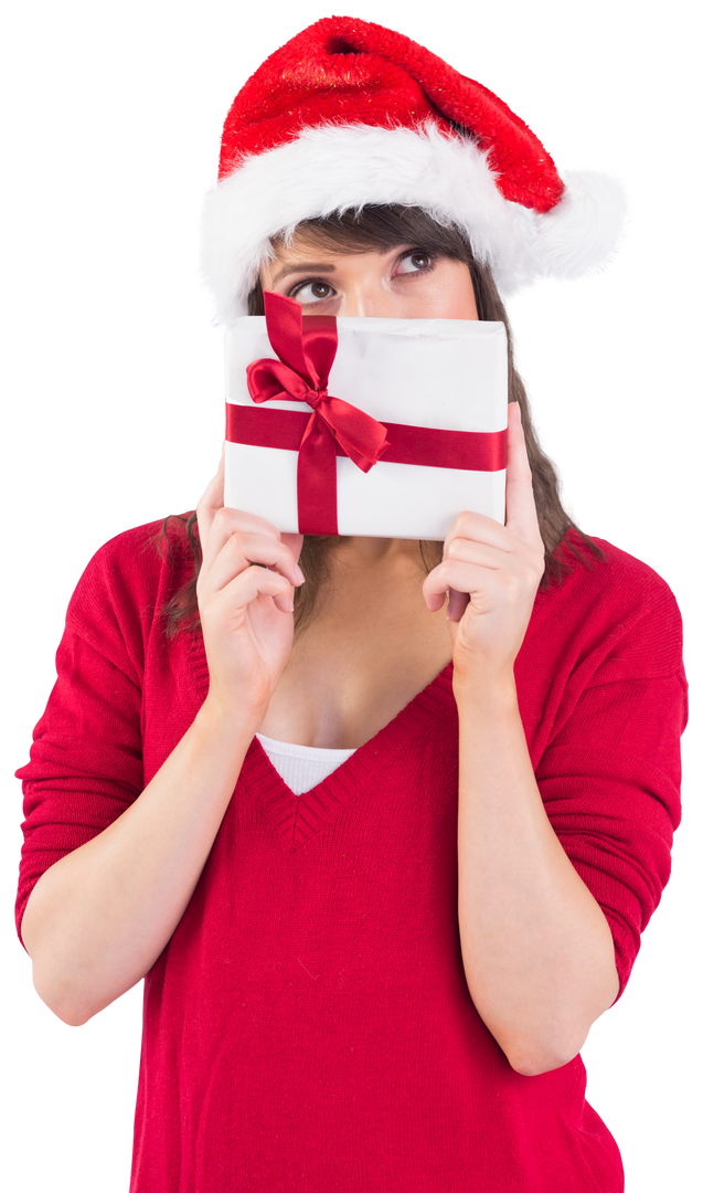 Festive Young Woman Holding Wrapped Holiday Gift in Santa Hat on Transparent Background - Download Free Stock Images Pikwizard.com