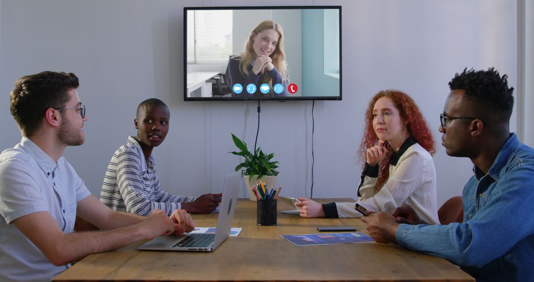 Multicultural Team on Video Conference Call in Modern Office - Free Images, Stock Photos and Pictures on Pikwizard.com