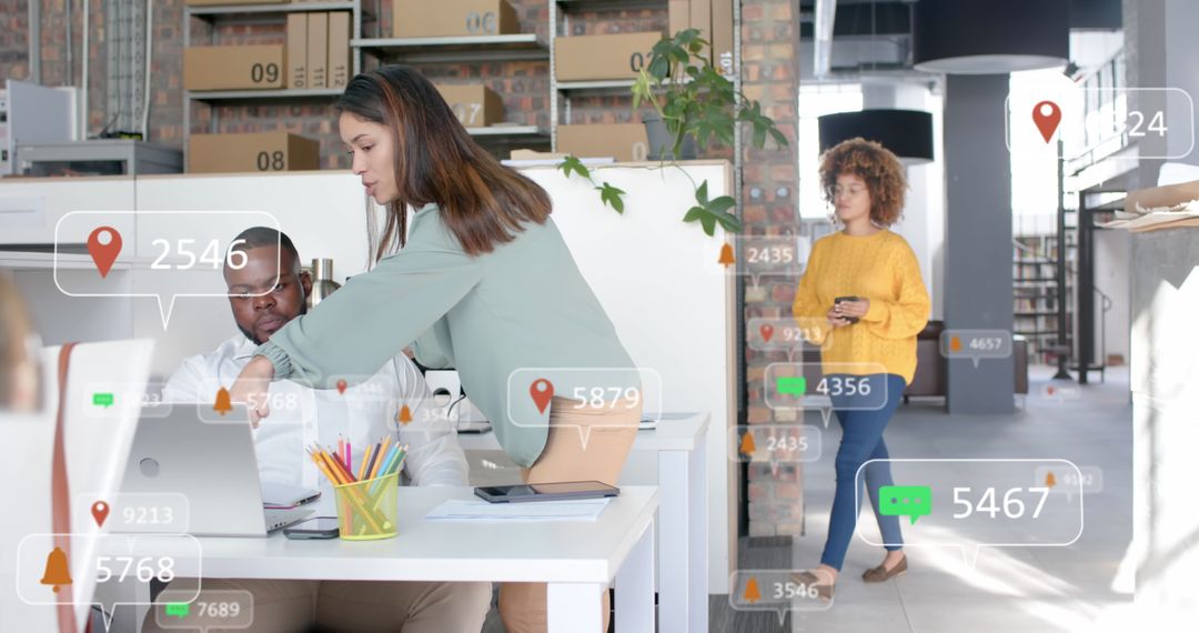 Colleagues Analyzing Social Media Data in Modern Workplace