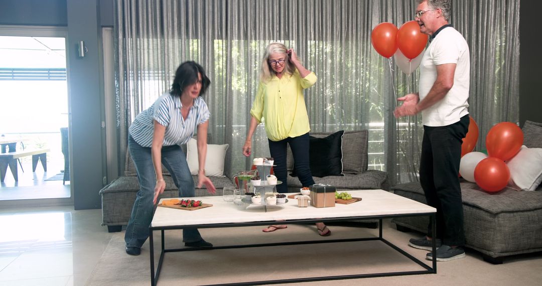 Friends Setting Up Festive Gathering at Is inviting Home