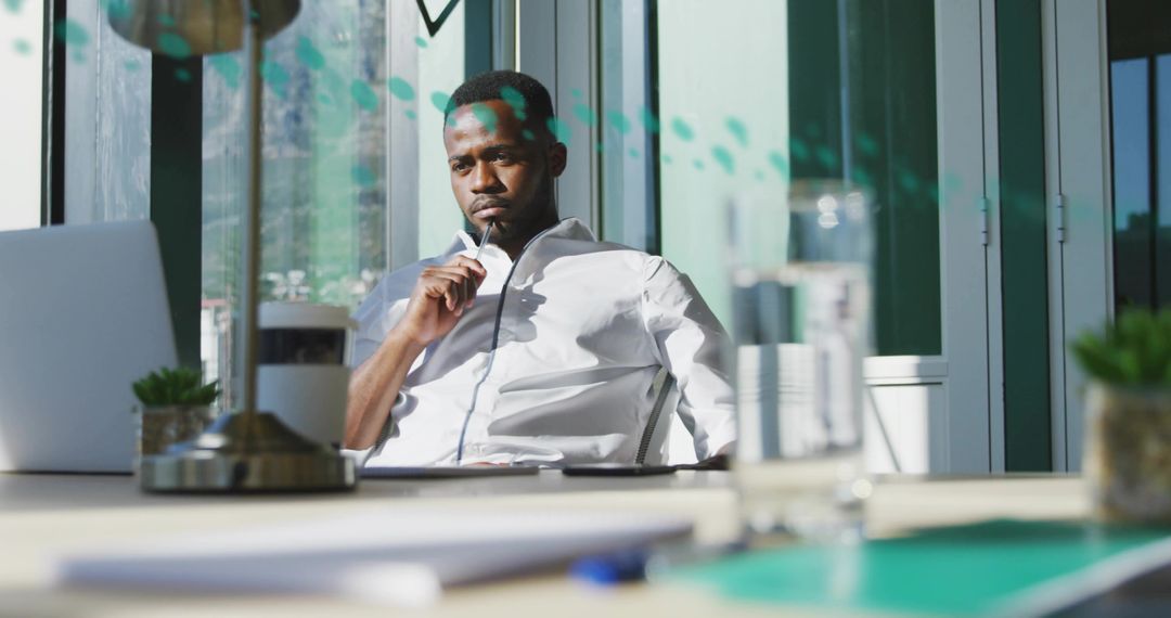 Professional Engaging in Thoughtful Planning at Modern Office Desk