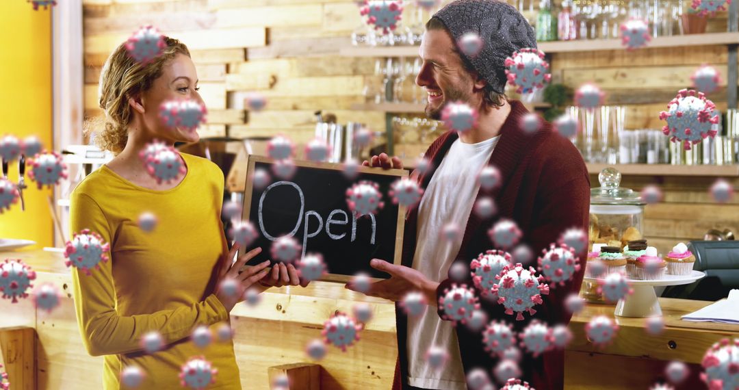Cafe Owners Holding Open Sign Surrounded by Virus Illustration