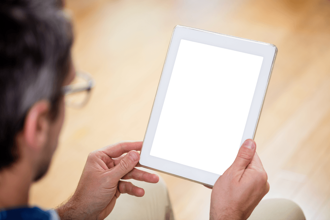 Close-Up of Man Interacting with Transparent Tablet Indoors
