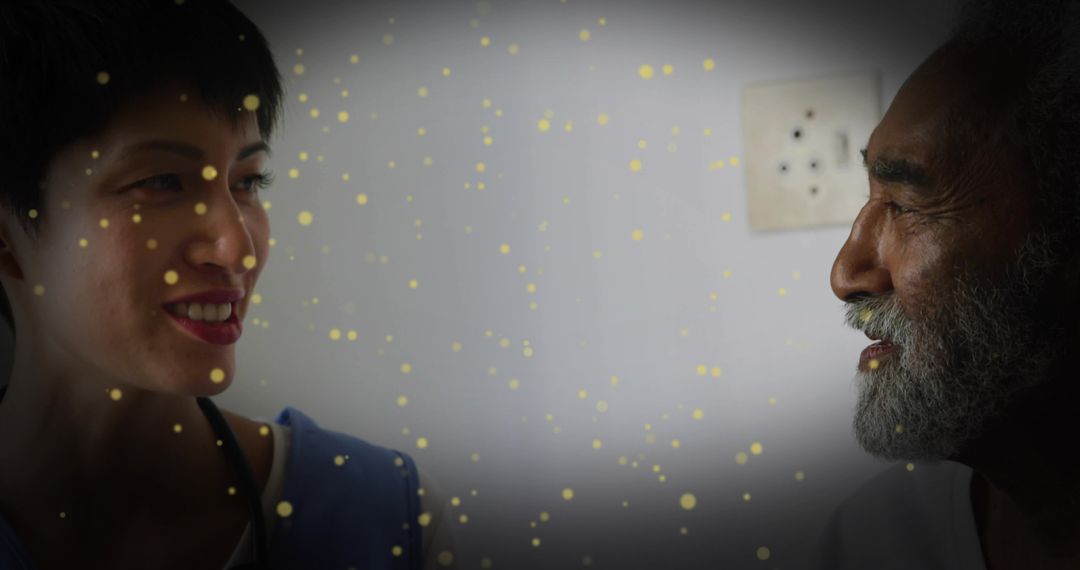 Intergenerational Conversation: Smiling Young Woman and Elderly Man with Golden Bokeh