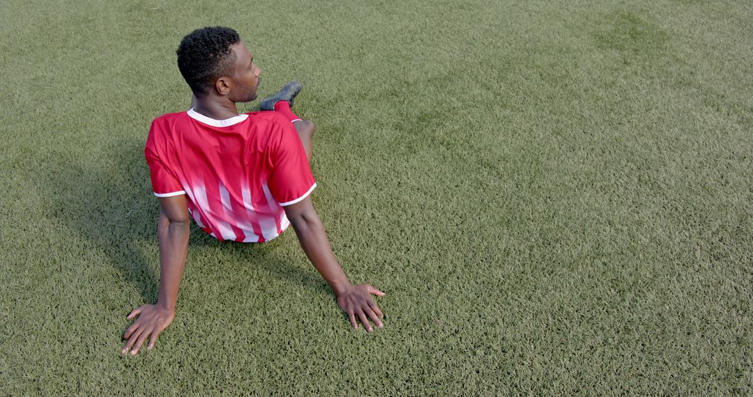 Resting Soccer Player on Turf Field
