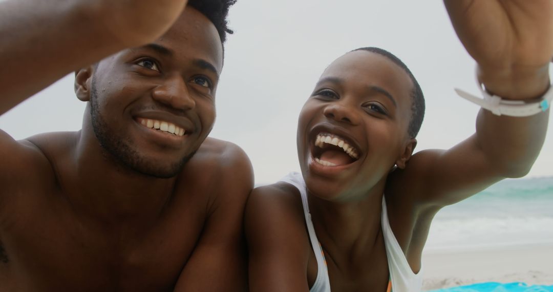 Smiling African American Couple Taking Beach Selfie