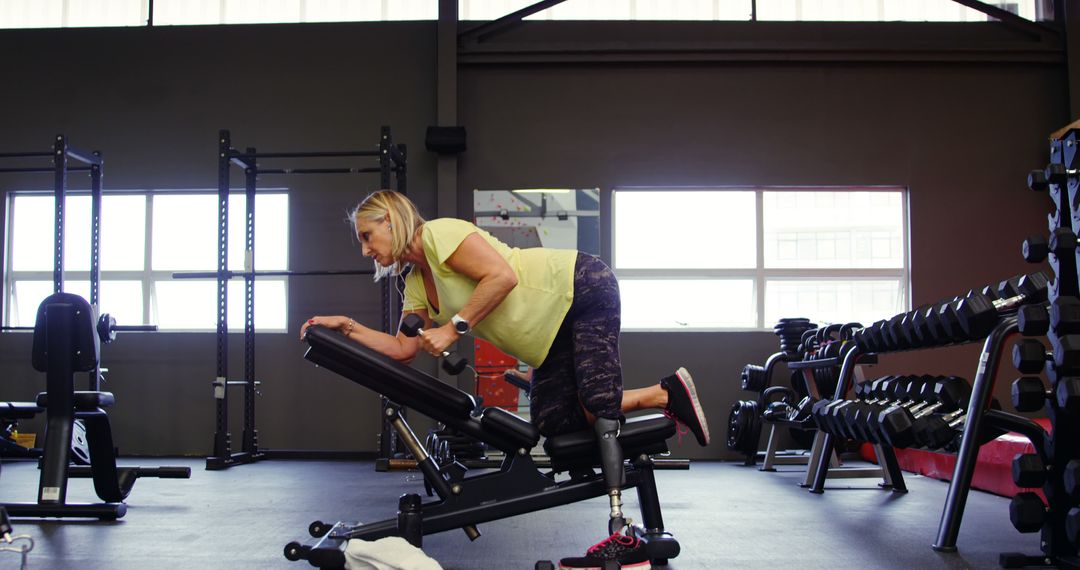 Woman Engaged in Fitness Training Indoors Using Workout Bench - Free Images, Stock Photos and Pictures on Pikwizard.com