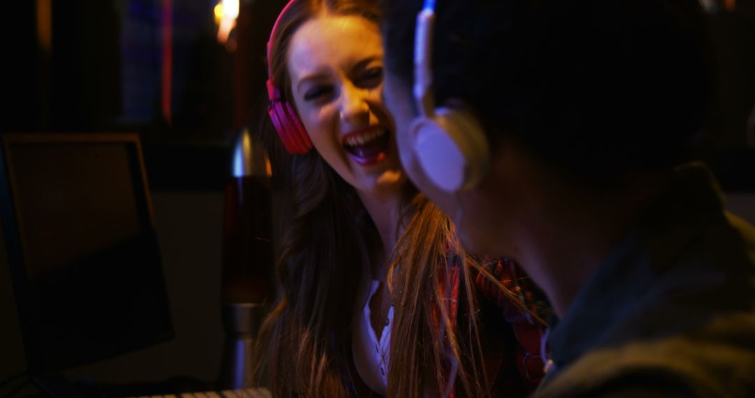 Audio Engineers Engaged in Lively Studio Session