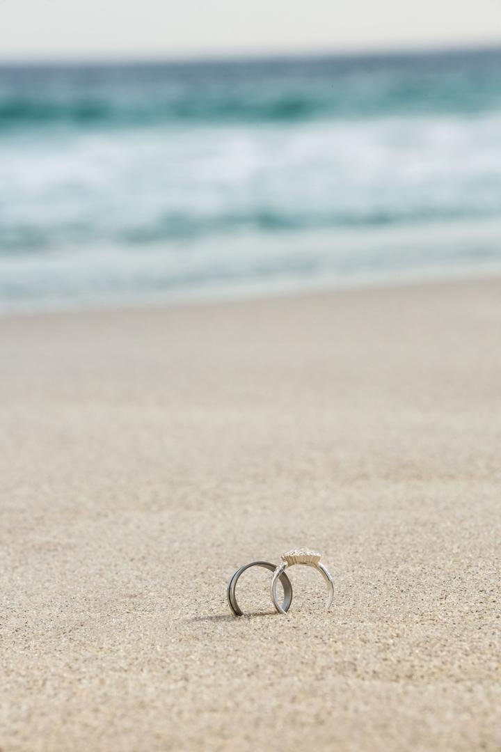 Wedding rings on sand - Free Images, Stock Photos and Pictures on Pikwizard.com