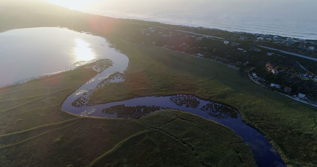 Aerial View of Scenic Coastal Marshland at Sunset - Free Images, Stock Photos and Pictures on Pikwizard.com